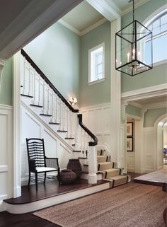 Wainscoating up the stairwell- looks great and prevents wall damage in high traffic areas Foyer Lighting, Foyer Decorating, Foyer Design, Stairway To Heaven, Entry Foyer, My New Room, Home Fashion, High Ceiling, My Dream Home