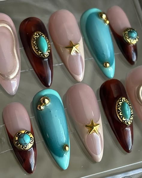 western cuties 🩵🐎✨ inspo: @miranaildit @shopagaloreco products used: *velvet teddy base *penny, espresso, rich brownie, cyan, jungle + indigo mixed *bling gel *diamond steel top coat use code ‘ALEXIA10’ at checkout 🤎 #nailart #nails #naildesign #nailaddict #pressons #pressonnails #pressonnailsforsale #pressonnailset #cltnails #cltnailtech Brown And Teal Nails Design, Western Style Nails Acrylic, Aqua And Brown Nails, Brown Turquoise Nails, Arabian Nights Nails, Wild West Nails, Turquoise And Brown Nails, Brown And Turquoise Nails, Brown And Teal Nails