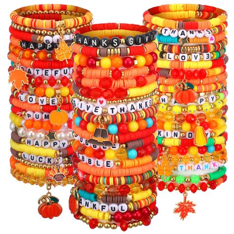 PRICES MAY VARY. Variety: you will receive 62 pieces of colorful stretch beaded bracelets in different styles, including maple leaves, pumpkins, 'thanksgiving' and other Thanksgiving elements; With classic colors, they are a delicate accessory for your wrist, and you can share them with your friends and family Comfortable Material: our stackable stretch bracelets are made from polymer clay and elasticated bands that are not only stylish but also easy to wear, with elasticity to fit wrists of dif Thanks Giving Bracelets, Thanksgiving Bracelet Ideas, Thanksgiving Bead Bracelet, Fall Clay Bead Bracelet Ideas, Thanksgiving Bracelet, Stretch Beaded Bracelets, Fall Bracelets, Candy Bracelets, Rainbow Vinyl