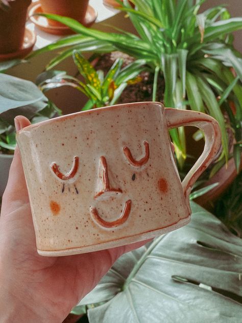 Ceramics ceramic handmade coffee cup smiling face mug Face Ceramic Mug, Mugs With Faces Ceramics, Cute Handmade Ceramics, Ceramic Mug With Face, Ceramic Mugs With Faces, Mug Face Pottery, Cute Mugs Handmade, Funky Pottery Mugs, Cute Mug Handles