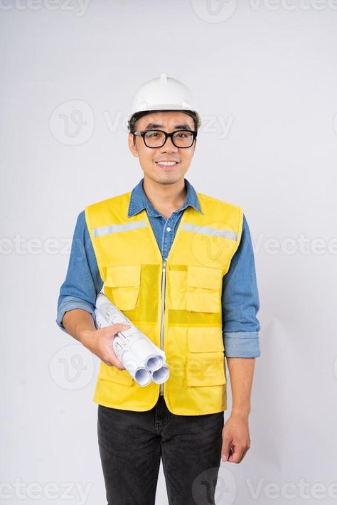 Smiling young asian civil engineer wearing helmet hard hat standing on isolated white background. Mechanic service concept. Engineer Costume, Engineering Careers, Costume Making, Career Day, Wooden Toys Plans, Civil Engineer, Hat Stands, Icon Set Vector, Civil Engineering