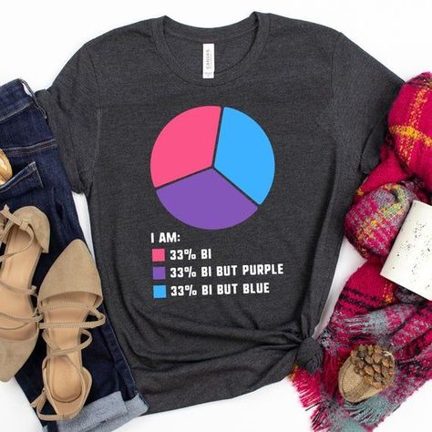 am proud to be bi in every sense of the word! This T-shirt is a perfect addition to your pride outfit, whether for a pride parade or everyday wear. Show your support for the LGBTQ+ community with this fun and stylish shirt. #gayprideshirts #prideoutfitideas #lesbianprideshirt Bi Fashion, Gay Shirts, Bisexual Flag, Gay Pride Shirts, Lgbt T Shirts, Pride Stuff, Lgbt Shirts, Pride Art, Pride Outfit