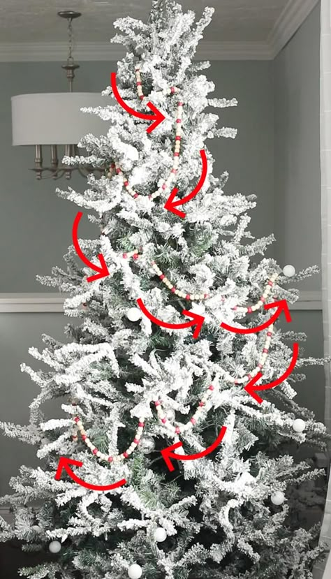 Vertical Garland On Christmas Tree, Lace Garland Christmas Tree, Beaded Garland For Tree, Christmas Tree Fuller How To Make, Curly Ribbon Christmas Tree, Wreath On Christmas Tree, White Garland On Christmas Tree, Christmas Tree With Pom Pom Garland, Decorating Bookshelves Christmas