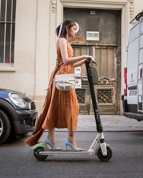 When she's not on her bike  she's riding an electric scooter Wearing @loewe bag via @monnierfreres  @maxine_shoes  @bymalenebirger dress Scooter Rental, Female Runner, Neon Artwork, Balancing Scooter, Scooter Girl, Loewe Bag, Nyc Life, Kick Scooter, Quirky Fashion