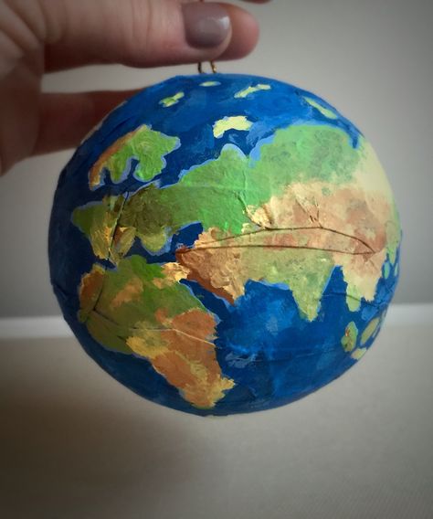 DIY Christmas tree ornament. Hand painted planet earth globe on machè ball Globe Diy, Painted Earth, Painted Globe, Diy Christmas Tree Ornaments, Earth Globe, Seventh Grade, Diy Stationery, Diy Christmas Tree, Christmas Tree Ornament