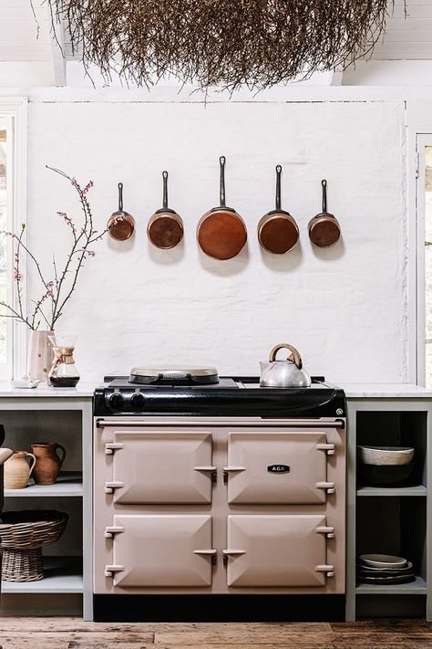 The AGA eR3 looks absolutely heavenly in blush 🩷 You can almost feel the warmth from the AGA – perfectly complimented with a copper and rustic aesthetic, this stunning kitchen brings autumn to life. It’s the kind of kitchen we all romanticise about…😍 Photography @marniehawson Styling @otisandotto @lislesgullymaldon Thanks to @agaaustralia for the inspiration. Aga Stove Kitchen, Aga Kitchen, Aga Stove, Aga Cooker, Stove Kitchen, Rustic Aesthetic, Fired Earth, Reno Ideas, Stunning Kitchens