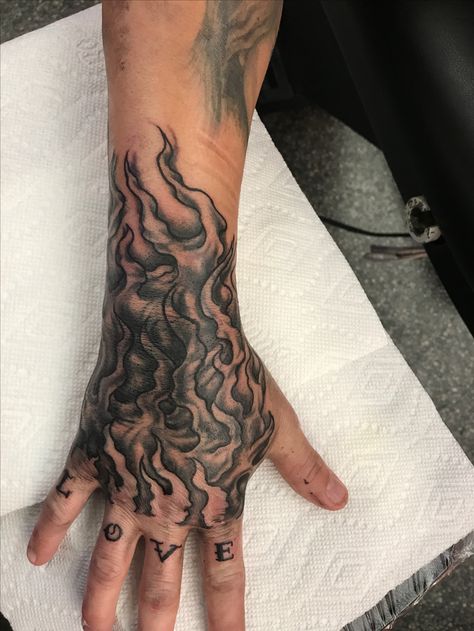 Fire Sleeve Tattoos For Guys, Flames Tattoo Hand, Hand Tattoos Flames, Flame Hand Tattoo Men, Raw Hand Tattoos, Fire Tattoo On Hand, Fire On Hand Tattoo, Otf Hand Tattoo, Hand Filler Tattoos