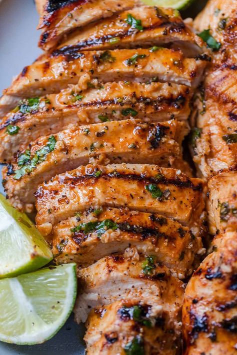 An EASY recipe for grilled Cilantro Lime Chicken, with a 5-minute prep time. The cilantro lime chicken marinade makes juicy, tender chicken. Key Lime Chicken, Grilled Cilantro Lime Chicken, Lime Chicken Marinade, Cilantro Lime Chicken Marinade, Lime Marinade For Chicken, Chimichurri Chicken, Lime Chicken Recipes, Bbq Chicken Breast, Grilling Menu