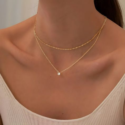 ✨ Discover the epitome of luxury with our enchanting Golden Diamond Pendant Necklace 💎, a must-have accessory for the modern woman who values elegance and grace. Handcrafted to perfection, this exquisite necklace combines the timeless allure of gold 🌟 with the captivating brilliance of a brilliant-cut diamond 💫. Indulge in the glamour and sophistication of this statement piece, meticulously designed to complement any outfit, from casual chic to formal elegance. Whether you're attending a roma Chic Gold Jewelry, Minimalistic Gold Jewelry, Golden Chain Designs For Women, Gold Chain Designs For Women, Golden Necklaces, Diamond Necklace Gift, Floating Diamond Necklace, Golden Diamond, Formal Jewelry