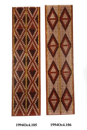 Composite wall panel (tukutuku) for a meeting house: peg-board base with horizontal wood slats (all painted dark red) with cross-stitched design in natural and dyed New Zealand flax (Phormium tenax) strips: longitudinal borders and central line in yellow, diamond patterns in white half-filled with black in each half; next to yellow lines white and black triangles. Māori Patterns, Tukutuku Patterns, Tukutuku Panels, Queenstown House, New Zealand Flax, Knit Slippers Free Pattern, Central Line, Maori Patterns, Maori Designs