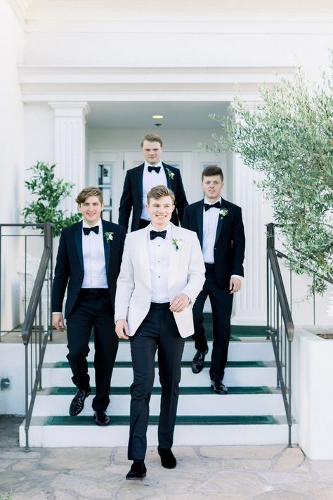 Groomsmen Attire Black, White Tuxedo Wedding, Flower Aisle, Black Tuxedo Wedding, White Tuxedo Jacket, Groomsmen Tuxedos, Groom And Groomsmen Suits, Groomsmen Looks, Black And White Suit