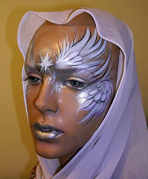 Angel Wings Face Paint, Angel Face Painting, Costume Eye Makeup, Feather Face Paint, Angel Face Paint, Bird Face Paint, High School Makeup, Bird Wings Costume, Eye Face Painting