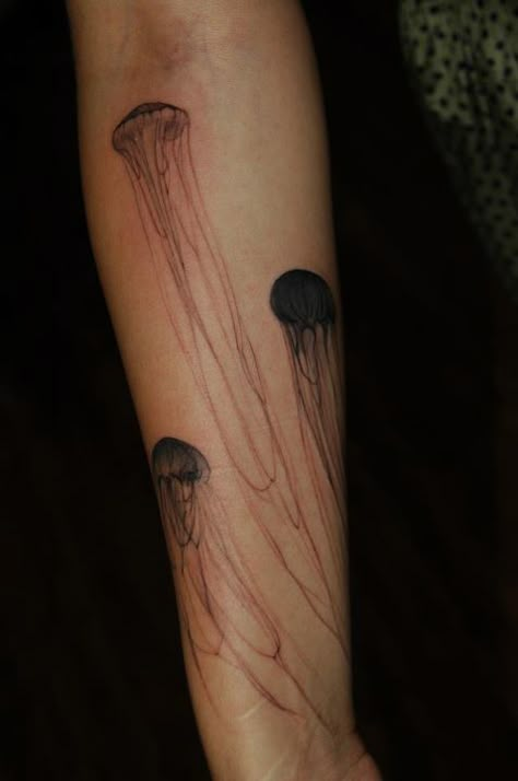 One of life's true water babies? Show it in ink.... Glow In The Dark Jellyfish Tattoo, Tattoos 2023, Backpiece Tattoo, Nerd Tattoo, Birthday Tattoo, Jellyfish Tattoo, Ocean Tattoos, Dope Tattoos, Skin Art