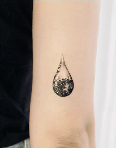 105+ Water Tattoo Ideas To Help You Go With The Flow Rain Puddle Tattoo, Droplet Tattoo, Water Flow Tattoo, Rain Drop Tattoo, Raindrop Tattoo, Water Tattoo Design, Rain Tattoo Ideas, Tattoo Rain, Water Tattoo Ideas