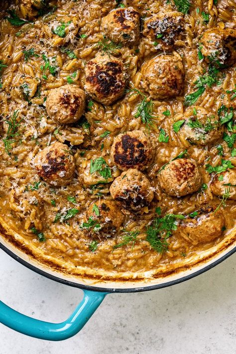 One pot Swedish meatballs with orzo – tasty pork meatballs cooked in a rich gravy with orzo pasta and finished with cream and Parmesan. Delish Swedish Meatball Orzo, Orzo Meatballs, Orzo And Meatballs, Meatball Orzo Soup, Meatballs And Orzo, Meatballs Orzo, Meatball Orzo, Meatball Pasta Recipes, Creamy Orzo