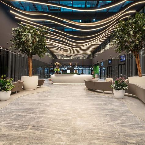 Coverlam Medusa from Grespania in Hillside Office Building, Budapest, Hungaria Cool Office Space, Building Entrance, Office Space Design, Farmhouse Barndominium, Lobby Interior, Luxury Office, Building Homes, Lobby Design, Barn Homes