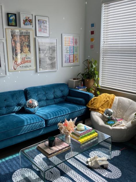 This Small Texas Rental Never Feels Dreary Thanks to Color and Disco Balls | Apartment Therapy Blue Couch Home Decor, Gallery Wall Blue Couch, Blue Aesthetic Living Room Ideas, Blue Aesthetic Interior Design, Blue Sofa Eclectic Living Room, Living Room Design With Blue Couch, Blue Couch Bedroom Ideas, Area Rugs With Blue Couch, Blue White Apartment