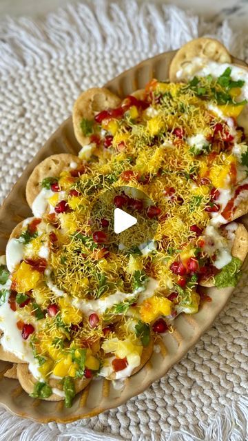 Pranomm on Instagram: "The perfect summer snack thats Quick & Easy, plus so DELICIOUS !   🍋‍🟩🥭Chatpati Mango Papdi Chaat   Ingredients  For the Desi Mango Salsa  1/2 diced Mango  1 chopped green chilli  Juice of 1 lemon  2 tbsp pomegranate  1 tbsp chopped fresh coriander  1/4 chopped sweet yellow pepper 1/4 chopped sweet red pepper  Salt to taste   For Assembling  Around 12-17  papdi /crackers  1/2 cup Whisked curd ( add 1/2 tsp salt, 1/2 tsp jeera powder in it )  1- 1.5 tbsp Saunt (sweet & tangy imili chutney)  1 tbsp green chutney (mint & coriander chutney)  1/4 cup boiled diced potato  1/4 cup sev  Fresh coriander to garnish   Method  In a bowl add all the ingredients for the desired mango salsa & give it a good mix.   Now for assembling our dish, first take a nice platter spread the Papri Chaat Presentation, Chaat Platter, Dahi Papdi Chaat Recipe, Papdi Chaat Recipe, Coriander Chutney, Chaat Recipe, Vegetarian Snacks Recipes, Green Chutney, Pepper Salt