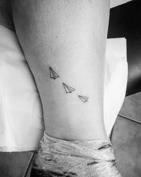 Paper airplane tattoo with big meanings 5 Small Tattoos With Big Meanings, Paper Airplane Tattoo, Paper Crane Tattoo, Paper Airplane Tattoos, Paper Plane Tattoo, Tattoo Fe, Word Tattoo Ideas, Airplane Tattoo, Plane Tattoo