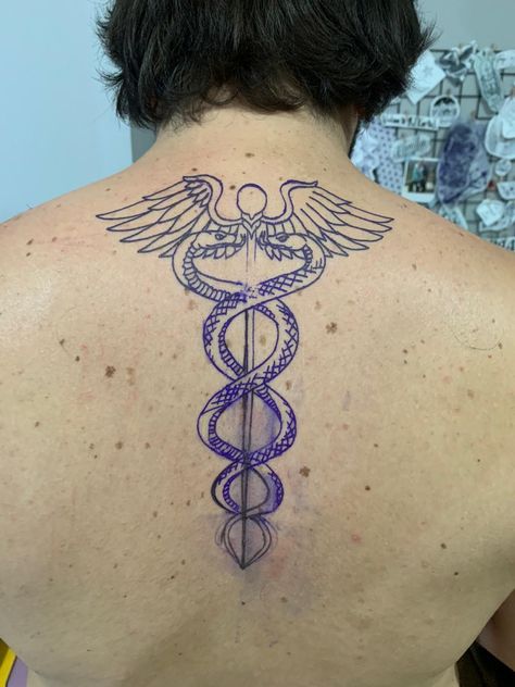 Caduceus tattoo The Caduceus Tattoo, Caduceus Tattoo Men, Medical Staff Tattoo, Caduceus Meaning, Caduceus Tattoo Feminine, Caduceus Aesthetic, Cadeusus Tattoo, Medicine Tattoo Ideas, Caduceus Art