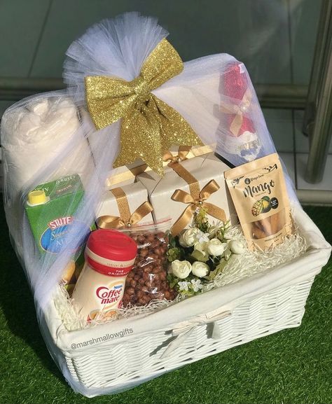 Groceries wrapped in white and beige theme in luxury white cane basket. Coffee Lover Gifts Basket, White Cane, Beige Theme, Creative Gift Baskets, Cane Baskets, Bridal Gift Wrapping Ideas, Gifts Wrapping, White And Beige, Bridal Gift