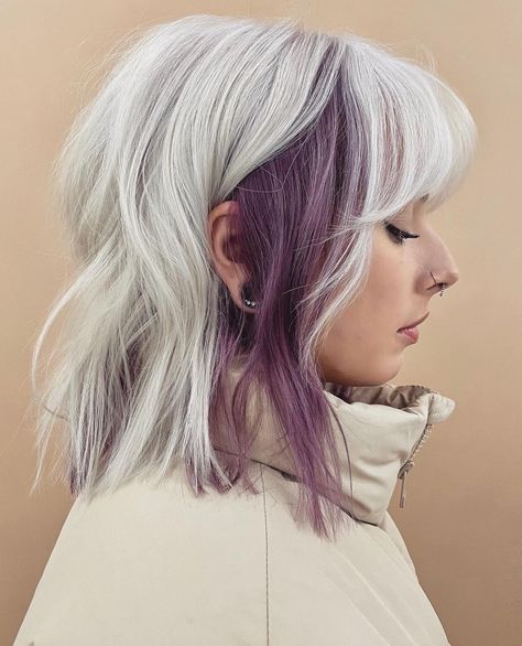 Gray And Vivid Hair, Underdye Hair Blonde On Top, Hair Color Underneath With Bangs, Pop Of Color Hair Placement, Muted Fashion Colors Hair, Purple And Platinum Blonde Hair, Edgy Purple Hair, Colored Money Piece Hair Blonde, Curtain Bangs Colored Hair