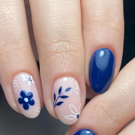 Shelley Graham on Instagram: "Ad) Winter florals, using Royal Navy from @the_gelbottle_inc Throwback to last years January nails. Don’t get stressed out if you feel you have no new content, it’s ok to recycle posts. It’s also a great way for new followers to see post they may of missed if they hadn’t scrolled back deep into the archives haha. #winternails #januarynails #flowernails #bluenails #winterblues #thegelbottleinc #gelbottle #gelpolish #accentnail #simplenailart #showscratch #tgbroyalnavy #gelbottleroyalnavy #tgbba2024 #throwback" Royal Blue Nails Designs, Floral Products, Hoco Nails, Blue Nail Art Designs, Royal Blue Nails, Navy Nails, Winter Florals, Navy Blue Nails, January Nails