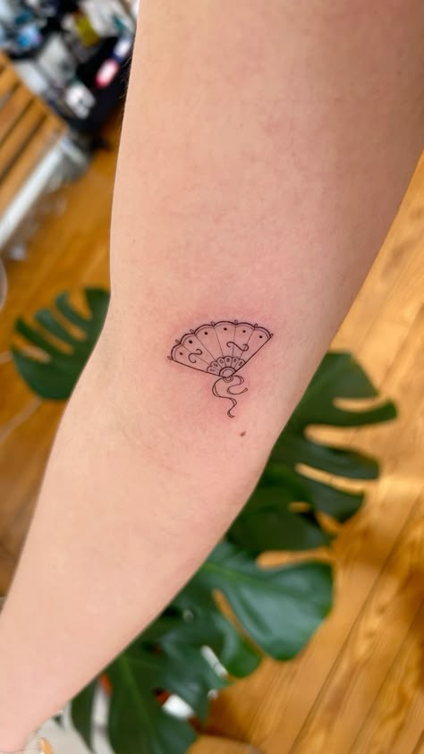 Dainty Spanish fan tattoo #lisbon #finelinetattoo #tattoo #fantattoo #lisbontattoo Fine Line Spanish Tattoo, Madrid Spain Tattoo, Spain Travel Tattoo, Spanish Minimalist Tattoo, Small Spain Tattoo, Spain Related Tattoos, Spain Symbols Tattoo, Fan Tattoo Fine Line, Spanish Fine Line Tattoo