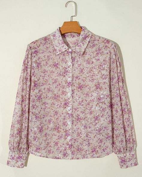 Printed Collared Neck Long Sleeve Shirt This floral button-up blouse features a soft beige background with pink and purple blossoms, accented with a subtle shimmer. It has a relaxed fit with long, puffed sleeves and a classic collar, offering a perfect blend of comfort and style. Link: https://sybariticboutique.com/products/printed-collared-neck-long-sleeve-shirt-2 #sybariticboutique #boutiquestyle #womenfashion #fashionnova #clothingboutique #clothingstores #elegantfashion #fashionlover ... Chic Shirts, Bishop Sleeve, Hoodies Mens, Style And Grace, Effortless Chic, Plus Size Swimwear, Basic Style, Floral Top, Floral Shirt