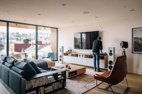 Sonos speakers are wired throughout the house, complemented by Magico S3 standing speakers in the family room. The leather Lama lounger is by Ludovica and Roberto Palomba for Zanotta. Tagged: Living Room, Chair, Sectional, Recessed Lighting, and Light Hardwood Floor. Living Room Speakers, Hifi Room, Sonos Speakers, Domino Effect, Muebles Living, Apartment Living Room Design, Audio Room, 아파트 인테리어, Living Room Remodel