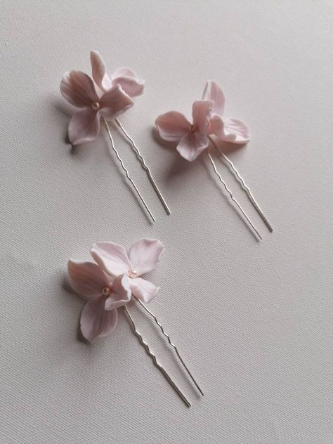 Daphne floral hair pins beautiful will look scattered in the hair up or combined together. Available in very pale blush pink or white, silver or gold details(hairpins/wire). ! Please, let me know in a note box or message me in which details would you like your hairpins to be, silver or gold. Made of light and durable clay, preciosa glass pearls and non tarnish jewellery wire.  Light and easy to wear.  Please don't hesitate to message me if you would like to add your touch to suit your style more Pink Flower Hair Accessories, Porcelain Hair Accessories, Light Pink Hair Accessories, Floral Bridal Hair Accessories, Floral Bridal Hair, Flower Headpiece Wedding, Pink Hair Accessories, Floral Wedding Hair, Flower Hairpin