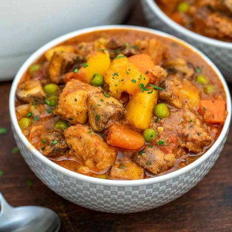 This rich pork stew recipe with root vegetables is a classic comfort food. Follow this tutorial for a rich stew with tender bits of pork in every bite. #PorkStew #Pork #Stew #Recipes #EasyDinners #DutchOvenRecipes Pork Stew Meat, Pork Stew Recipes, Pan Gravy, Sausage Stew, Ground Beef And Potatoes, Pork Stew, Roasted Chicken Breast, Crockpot Recipes Beef, Stew Recipe