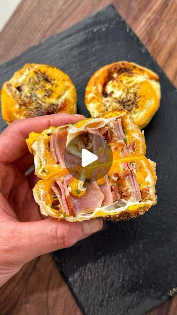 Josh Elkin on Instagram: "You’re definitely going to want to make these Breakfast Cupcakes. Ingredients below (makes 6) #breakfast #neverskipeggday  INGREDIENTS 1 large flour tortilla 2 cups grated cheddar cheese 1 cup spreadable cheese (I used laughing cow) 2 tbsp chopped chives 1/2 cup chopped cooked bacon bits 4 slices smoked ham 6 eggs" Breakfast Ham Sandwiches, Breakfast Cupcakes Egg Bacon, Breakfast Ham Recipes, Ham Egg And Cheese Bagel Sandwich, Tortilla Egg Cups, Football Breakfast Ideas, Egg Cupcakes Breakfast, Portable Breakfast Ideas, Savory Breakfast Ideas