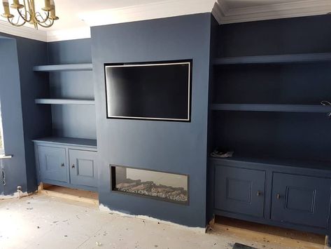 Stiffkey blue and embedded tv Navy Blue Panelling Living Room, Media Wall Navy Blue, Navy Living Room Panelling, Blue Tv Wall Living Room, Dark Blue Media Wall, Dark Blue Tv Wall, Navy Media Wall, Blue Media Wall, Navy Blue Feature Wall Living Room