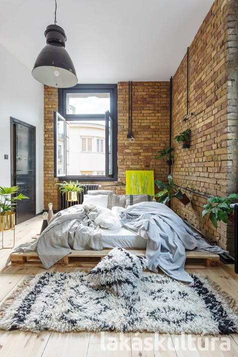 Exposed Brick Bedroom Wall, Brick Boho Bedroom, Boho Bedroom With Brick Wall, Bedroom With Exposed Brick, Exposed Brick Loft, Masculine Bedroom Brick Wall, Exposed Brick Bedroom, Brick Wall Bedroom, Brick Bedroom