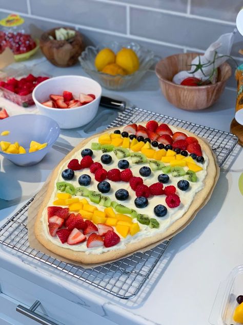 Easter Egg Fruit Cookie Tart | The Skinny Pig Egg Shaped Fruit Pizza, Easter Fruit Cookie Pizza, Pizza With Fruit, Easter Pizza Italian, Easter Egg Fruit Tart, Easter Egg Fruit Pizza, Sugar Cookie Easter Egg Fruit Pizza, Sugar Cookie Fruit Tart, Easy Sugar Cookie Fruit Pizza