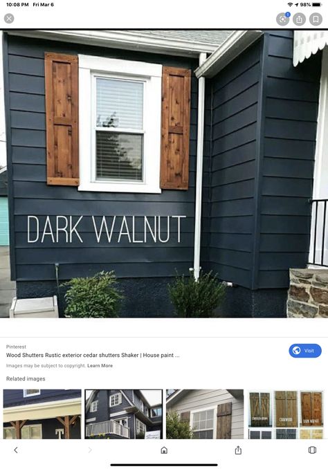 Gray Siding With Wood Shutters, Dark Grey House Wood Shutters, Navy House Black Shutters, Black House Wood Shutters, Black House Wooden Shutters, Blue And Grey House Exterior, Black House With Wood Shutters, Midnight Blue House Exterior, Dark Blue Exterior House Colors