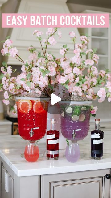 Brittany | Home Decor & Style on Instagram: "Batch cocktails using @Empress1908Gin Indigo and Elderflower Rose Gin |AD| These drinks are perfect for wedding celebrations, bridal showers, and summer parties! See full cocktail recipes below! #EmpressGin #EmpressIDO #SipResponsibly

INGREDIENTS:

Purple Mojito Lime Drink 💜 (Serves 12 people)
-3 cups Empress Indigo Gin 
-3 liter Limeade
-1 liter Soda Water
-Sliced Limes + Lime Juice/Limeade to freeze in cubes
-Mint to taste + Garnish

Pink Grapefruit Drink 💗 (Serves 12 people)
-3 cups Empress Elderflower Rose Gin
-3 liter Grapefruit Juice
-1 liter Soda Water
-Sliced Grapefruit + Grapefruit juice to freeze in cubes
-Rosemary to Garnish

TIP: Add the Soda Water/ Sparkling Water last and not too far in advance before serving to avoid flat drink Empress Gin Punch, Purple Mojito, Sliced Grapefruit, Alcohol Soaked Fruit, Elderflower Liquor, Bachelorette Food, Empress Gin, Water Sparkling, Grapefruit Drink