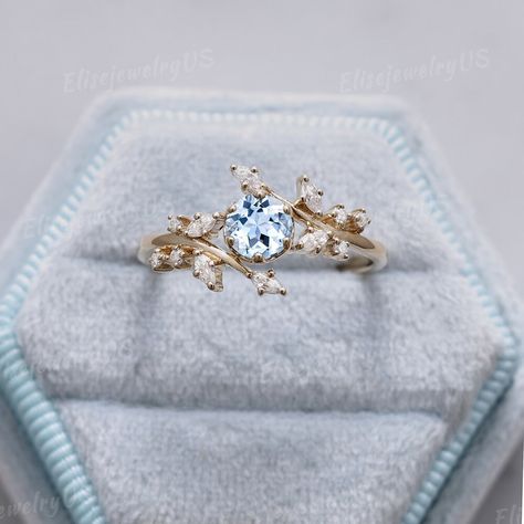 Aqua Engagement Ring, Beachy Wedding Rings, Engagement Rings Leaves, Water Themed Engagement Rings, Nature Themed Engagement Rings, Elegant Light Blue Wedding Ring, Engagement Ring With Aquamarine Accents, Ocean Inspired Ring, Nature-inspired Blue Ring Jewelry