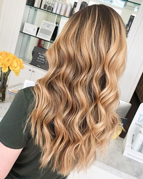 This beige blonde balayage features long icy layers to keep the overall color result full of dimension. Beach Waves Hair With Braid, Beachy Waves Side Part, Curled Hair Beach Waves, Prom Beach Waves, Grade 8 Graduation Hairstyles, Grade 8 Grad Hair, Grad Pic Hairstyles, Wedding Beach Waves, Light Beach Waves