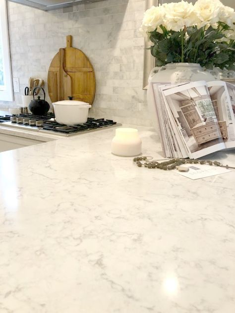 Shaker style white cabinets in simple serene kitchen with white oak floors and Viatera Minuet quartz countertops - Hello Lovely Studio. Quartz Countertops With Oak Cabinets, Viatera Minuet Quartz Countertops, Minuet Quartz Countertops, Serene Kitchen, Quartz Kitchen Countertops White, Backsplash Quartz, Townhouse Kitchen, Modern Classic Kitchen, White Kitchen Inspiration