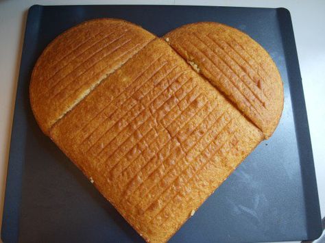 Using a large tray, assemble the unfrosted cake.  Place the square cake on the diagonal and place the two halves of the circular cake at the top left and right.  The heart shape is formed. Heart Shaped Birthday Cake, Heart Shaped Cake Pan, Foot Soak Recipe, Unfrosted Cake, Cake Techniques, Heart Shaped Cake, Cake Templates, Square Cake, Shaped Cake