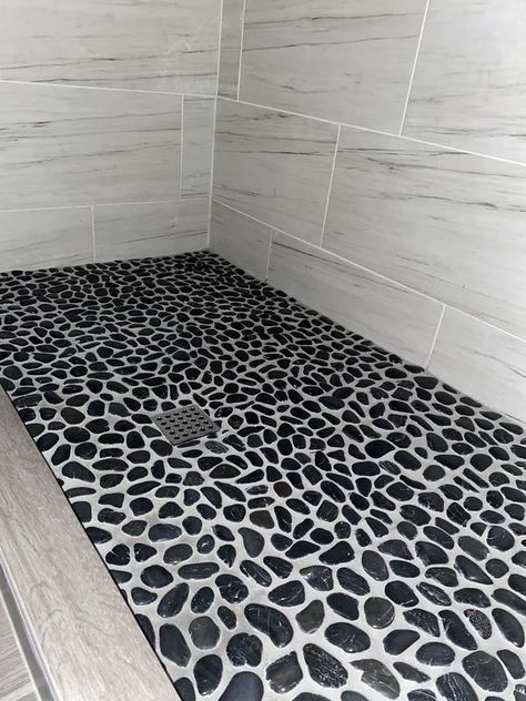 Rain Forest Polished pebble tiles 5-Pack Black 12-in x 12-in Glossy Natural Stone Pebble Floor Tile in the Tile department at Lowes.com Black Rock Shower Floor, Black Pebble Shower Floor, Pebble Floor Tile, Stone Shower Floor, Pebble Stone Flooring, Pebble Shower Floor, White Marble Shower, Pebble Tiles, Rock Shower