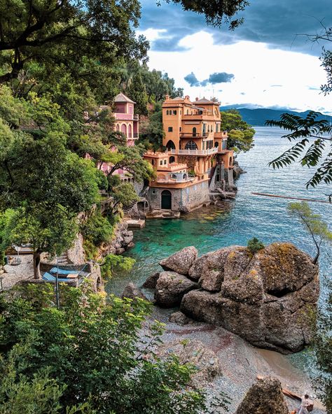 View of Portofino Italy with orange and pink buildings, green foliage and blue sea Italy Destinations, Portofino Italy, Food To Eat, Travel Trailer Remodel, Vision Board Pictures, Italian Architecture, Italy Tours, Spring Trip, Bag Essentials