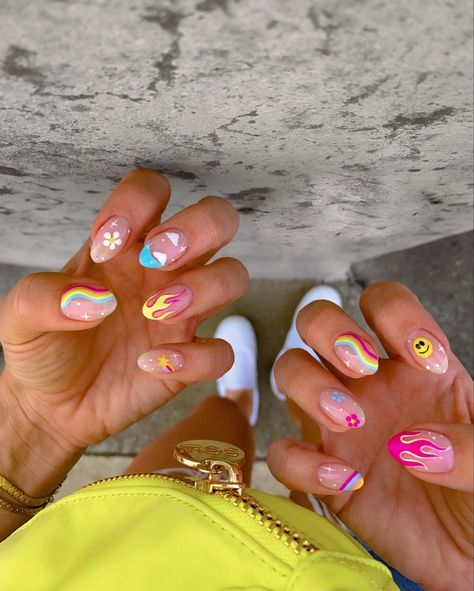 Music festival nails with bright colors, smileys, flames & stars Cool Rave Nails, Nails For Festival Summer, Almond Festival Nails, Rave Festival Nails, Crazy Color Nails, Coachella 2024 Nails, Music Fest Nails, Nails For Music Festival, Funky Festival Nails