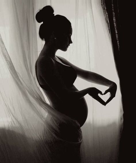 Classy silhouette pregnancy photography. Cute ideas for maternity photos in black and white. Love her hair style, body and the heart over her belly. Self-portrait by © Pernille Nygård by bessie Beautiful Pregnancy Photos, Vom Avea Un Copil, Maternity Silhouette, Baby Fotografie, Beautiful Pregnancy, Maternity Photoshoot Poses, Maternity Photography Poses, Foto Tips, Maternity Poses