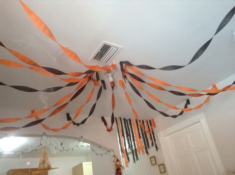 Halloween streamer ceiling decoration Streamer Ceiling, Halloween Ceiling Decorations, Halloween Streamers, Halloween Ceiling, Ceiling Streamers, Halloween Classroom Decorations, Diy Streamers, College Halloween Party, Streamer Decorations