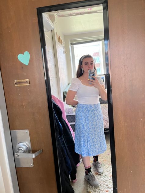 Blue floral midi skirt (thrifted), cropped white blouse with puff sleeves (kohls), blue headband (old navy), blue earrings with oranges (thrifted), abstract cag socks (gifted) Blue Floral Midi Skirt, White Crop Blouse, Blouse With Puff Sleeves, Navy Blue Earrings, Blue Headband, Floral Midi Skirt, Sock Gifts, Blue Earrings, White Blouse