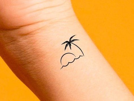 24 Beautiful Palm Tree Tattoo Ideas for Women - Inspired Beauty Mini Florida Tattoo, Mother Daughter Palm Tree Tattoos, Palm Tree Tattoo Forearm Women, Palm Tree Tattoo Placement, Fine Line Beach Tattoo Ideas, Small Beach Tattoo For Women, Cancun Tattoo, Fine Line Palm Tree Tattoo, Beach Tattoo Ideas For Women