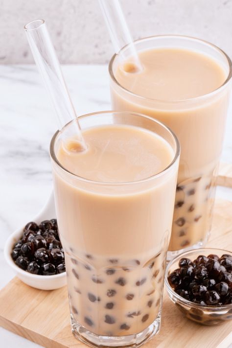 Why pick between coffee and tea when you may have both at the same time? This Hong Kong Style Yuanyang Coffee Milk Tea combines the two popular beverages into a delicious drink with a caffeine kick. It's great hot or cold! The term "Yuanyang" (also known as yuenyeung in Cantonese) means "Mandarin duck," and if you look at a photo of the male and female, you'll see they're pretty different. #coffee #drinks #milk #milktae Coffee Milk Tea Recipe, Sous Vide Chuck Roast, Instant Boba, Boba Kit, Bubble Tea Flavors, Coffee Milk Tea, Milk Tea Recipes, Sous Vide Recipes, Coffee Mix